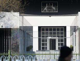 Australia tells China of outrage over writers suspended death sentence