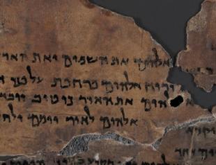 AI reads ancient scroll buried by Vesuvius eruption