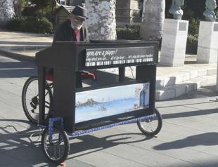 Bodrum resident serenades town with bicycle piano