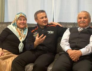 First Turkish astronaut reunites with his family