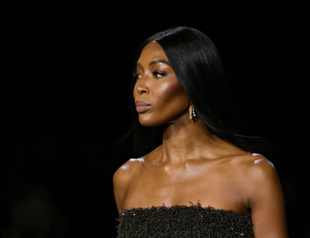Naomi Campbell walks at London Fashion Week