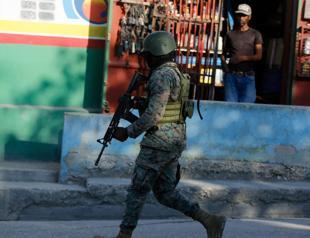 Haiti capital paralyzed after unrest, PM still abroad