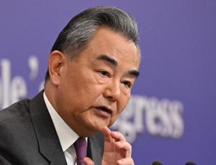 Chinese FM blasts US suppression, defends Russia ties