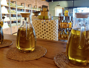 Olive oil stocks piling up