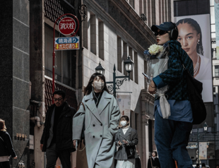 Struggling Japan narrowly avoids technical recession