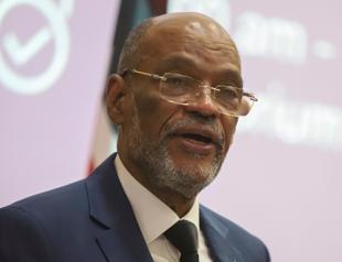 Haiti PM agrees to leave in regional push to end crisis