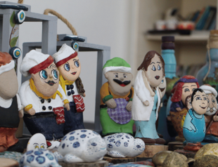 Stones collected from nature become dolls