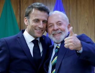 Macron quips about cuddly wedding pics with Lula