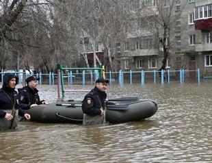 Russia says over 10,000 residential houses flooded across Urals, Siberia