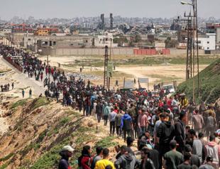 Israel presses on in Gaza as world awaits response to Iran attack