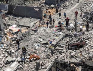 Israeli army vows response to Iran strikes as Gaza crumbles