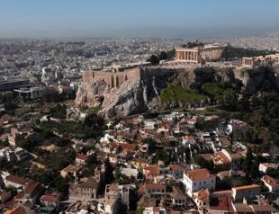 S&P lifts Greeces outlook on debt reduction