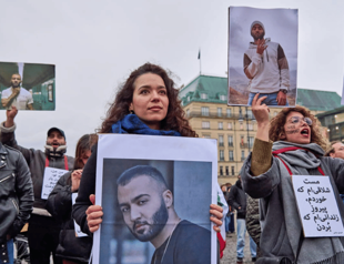 Iran urged to spare rapper after grotesque verdict