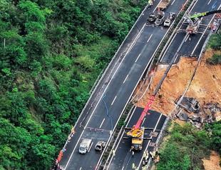 At least 24 people killed in south China road collapse