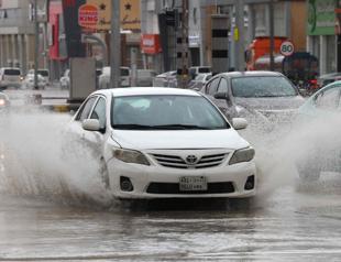 Rains shutter Saudi schools, flood roads