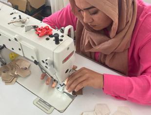 Women become breadwinners with hand-sewn balls in Burdur