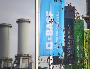 German industrial output falls but less than feared