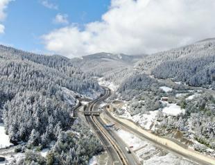 Unexpected spring snow blankets high-altitude regions