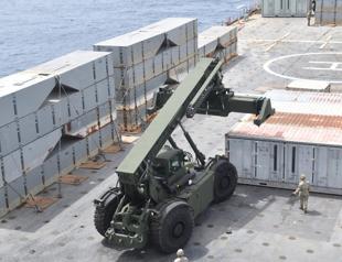 US military says aid pier anchored to Gaza beach