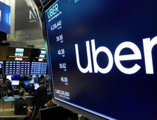 Uber says expanding shuttles in US, other services