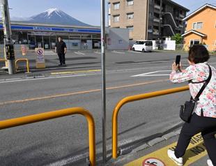 Japan town blocks view of Mt Fuji