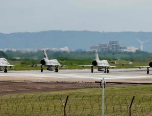 China holds war games around Taiwan, vows flowing blood