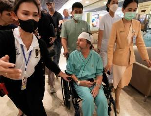 Brain, skull and spine injuries on turbulent Singapore flight