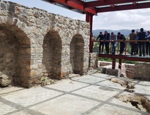 Roman Bath protected by glass terrace
