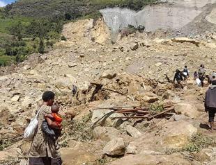 Children in shock as aid reaches Papua New Guinea landslide site