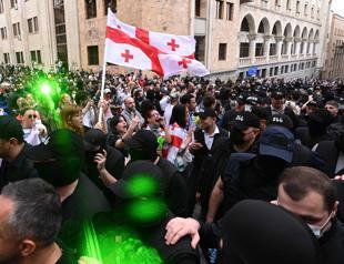 Georgia NGOs vow to defy influence law as thousands rally to protest