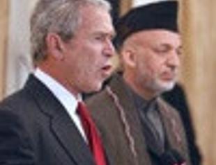 Bush wraps up trip to war zones