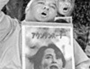 Myanmar’s democracy icon denies charges at tribunal