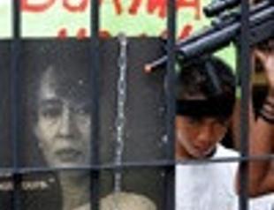 Myanmar puts Suu Kyi on trial