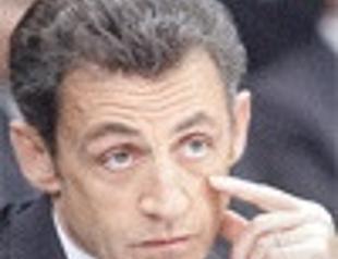 Sarkozy throws cold water on G20 draft deal