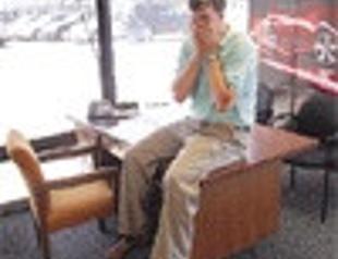 GM kneels before bankruptcy court