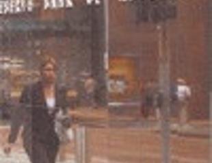 Australia cuts key rate, introduces stimulus plan