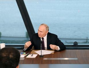 Putin says Russia has no imperial ambitions, does not plan to attack NATO