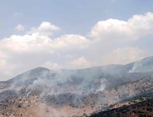 Hezbollah rains rockets on Israel after strike kills commander