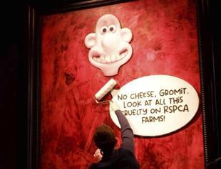 UK animal rights activists target kings portrait