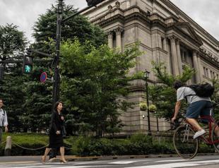Bank of Japan to scale down huge bond-buying program