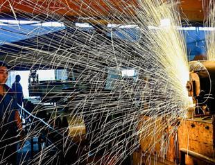 China retail sales up, industrial production slows in May