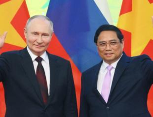 Russia, Vietnam vow to strengthen ties as Putin visits