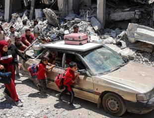 Palestinians flee as Israeli troops, warplanes strike north Gaza