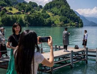 Switzerland tries to even out visitors