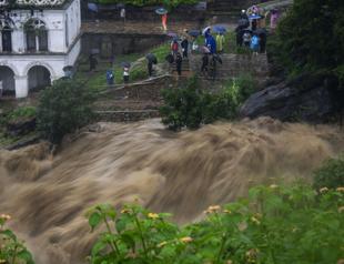 Floods and landslides kill 14 in Nepal: police