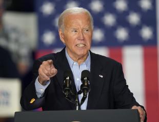 Biden back on campaign trail as pressure mounts