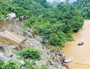 63 missing after Nepal landslide sweeps two buses into river