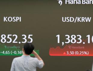 Stocks mixed, dollar rises as traders weigh Trump shooting
