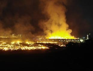 Flames ravage paper factory in western city for days