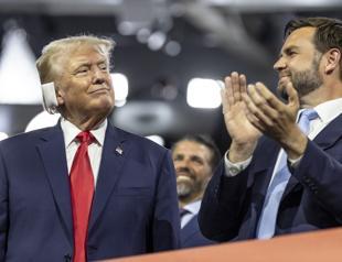 Trump appears at convention with bandaged ear after shooting